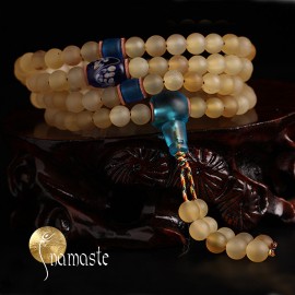 japa Mala Tibétain en corne blonde AAA et cristal bleu dépoli 108 perles 6/7 mm